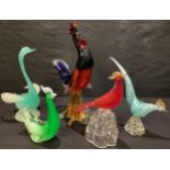 A Murano art glass model of a stylised slender necked bird, vaseline glass, in shades of