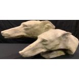 A reconstituted garden sculpture, Greyhounds racing in profile, 47cm wide