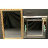A contemporary cushion framed mirror, 53cm square; another, gilt framed, 70cm x 45cm