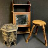 An early 20th century oak wall hanging cabinet, c.1900'; a kitchen stool, three legs; a Middle