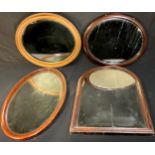 An early 20th century gilt oval mirror, 60cm x 50cm; others, mahogany (4)