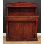 An early Victorian mahogany chiffonier, pointed-arch back with rectangular shelf, the projecting