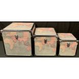 Interior Design - a contemporary set of three graduating square steamer type trunks, the sides of