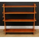A retro mid-20th century open bookcase, of pegged construction, 101cm high, 109cm wide, 30.5cm deep