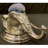 A silver plated novelty pin cushion, as an Indian elephant, 18cm long