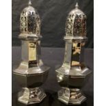 A pair of George V silver sugar casters, Birmingham 1911, hollow filled, 170g