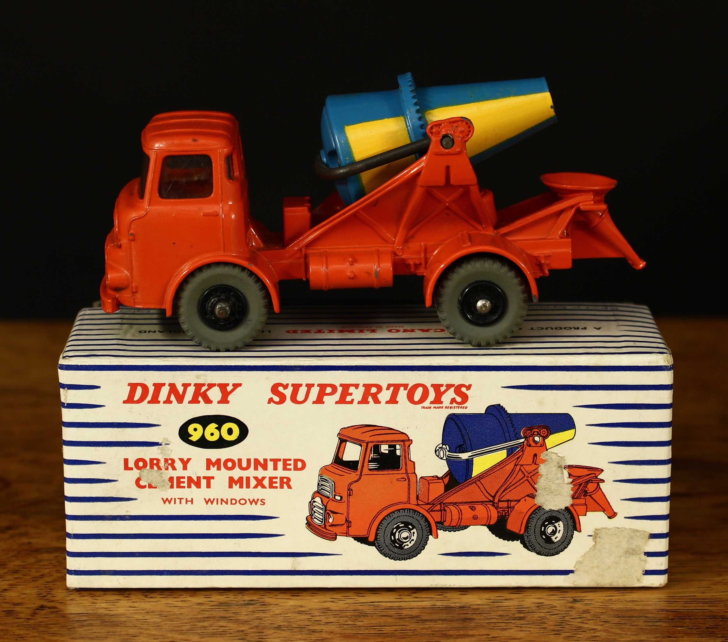 Dinky Supertoys 960 lorry mounted cement mixer with windows, orange cab and body with yellow and