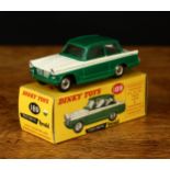 Dinky Toys 189 Triumph Herald with windows, green and white body, chrome spun hubs, boxed - yellow