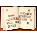 Stamps - red KGVI illustrated stamp album, by Stanley Gibbons, with 850+ stamps, mint and used,