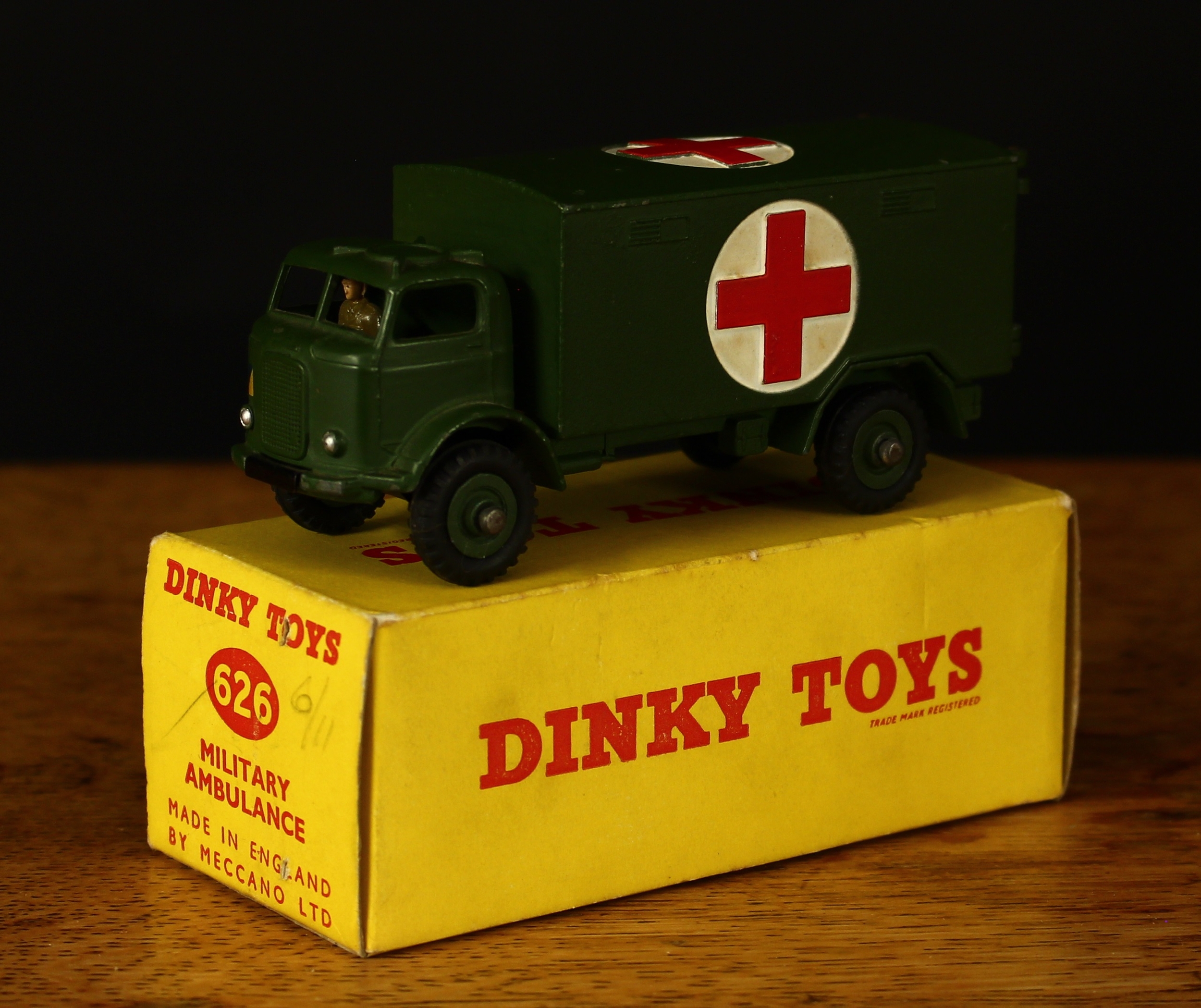 Dinky Toys 626 Military Ambulance, military green body with red crosses, painted seated driver