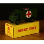 Dinky Toys 626 Military Ambulance, military green body with red crosses, painted seated driver
