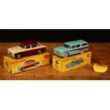 Dinky Toys 165 Humber Hawk with windows, maroon and tan body, chrome spun hubs, boxed - yellow