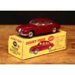 Dinky Toys 195 Jaguar 3.4 saloon with windows, maroon body with white interior, chrome spun hubs,