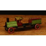 A German tinplate Penny Toy steam locomotive, multicoloured tinplate body with single chimney, red
