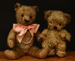 A 1930's Chad Valley novelty golden mohair jointed teddy bear, amber and black glass eyes,