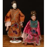 An early 20th century Chinese Opera doll, painted composition head with features, dressed in a
