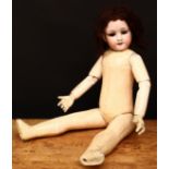 An Armand & Marseille (Germany) bisque head and partly fixed ball jointed composition bodied doll,