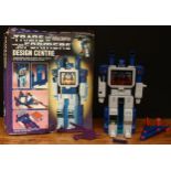 A House Martin/Hasbro No.1123 Transformers design centre, comprising main robot with three