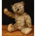 A 1930's J.K.Farnell (John Kirby Farnell) golden mohair jointed teddy bear, clear and black glass