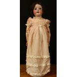 A Heubach Köppelsdorf (Germany) bisque head and ball jointed composition bodied doll, weighted