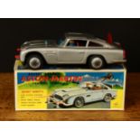 A 1960's ASC (Aoshin, Japan) No.1-230 'James Bond 007' tinplate and friction driven Aston-Martin,