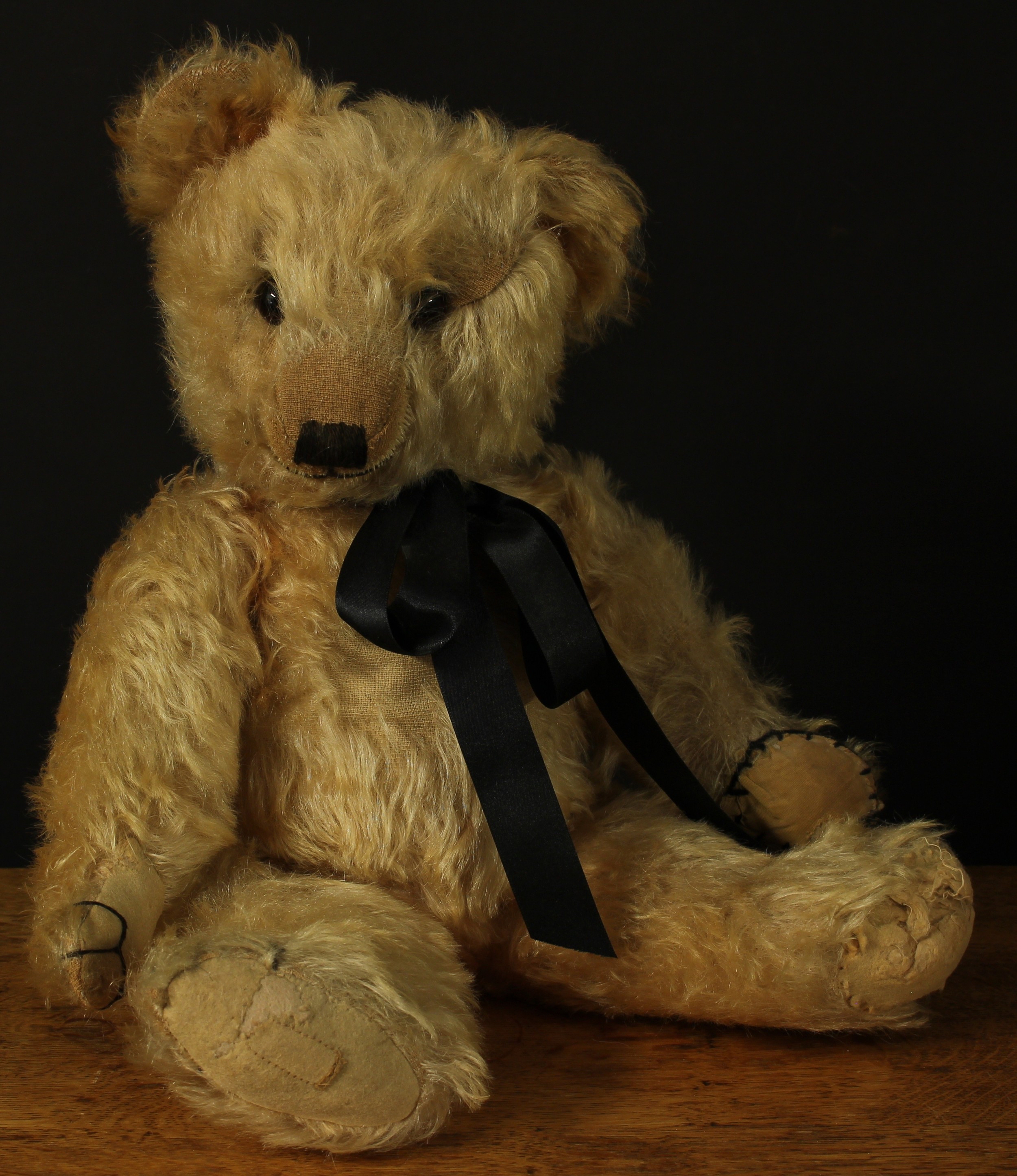 A 1930's/1940's golden mohair jointed teddy bear, probably by Merrythought, amber and black glass