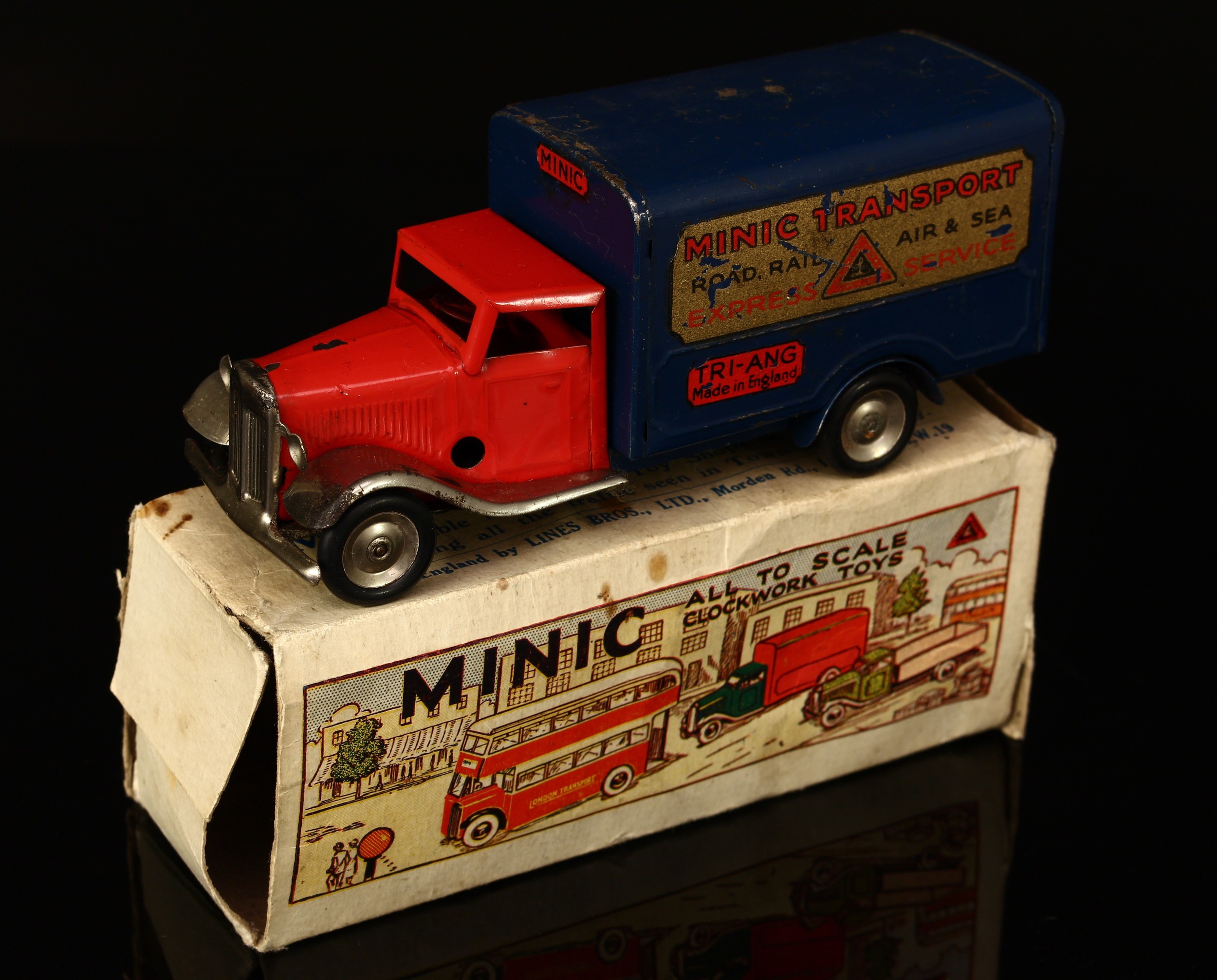 Tri-ang Minic (Lines Brothers) tinplate and clockwork 21M delivery van, red cab with polished plated
