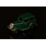 Tri-ang Minic (Lines Brothers) tinplate and clockwork 1M Ford saloon, dark green body, unboxed