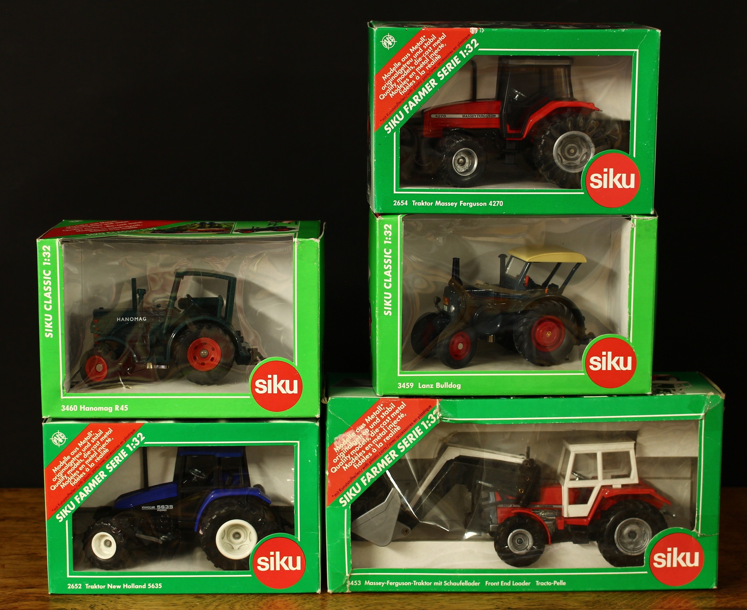 A collection of Siku 1:32 scale models, comprising 2652 New Holland Ford tractor, window boxed; 2654