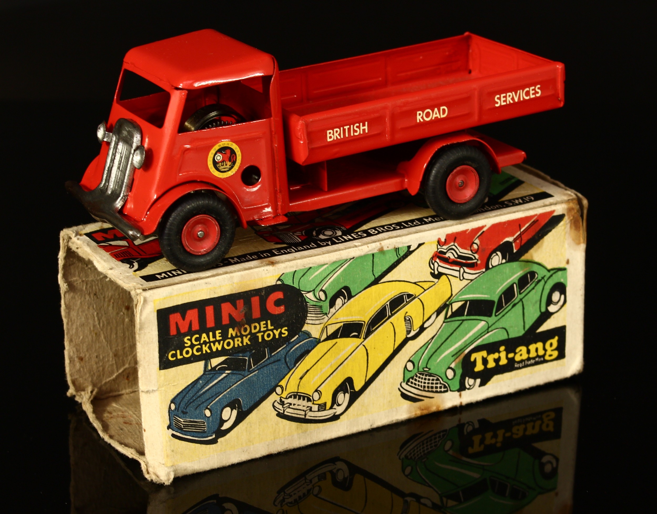 Tri-ang Minic (Lines Brothers) tinplate and clockwork British road services open lorry, red cab