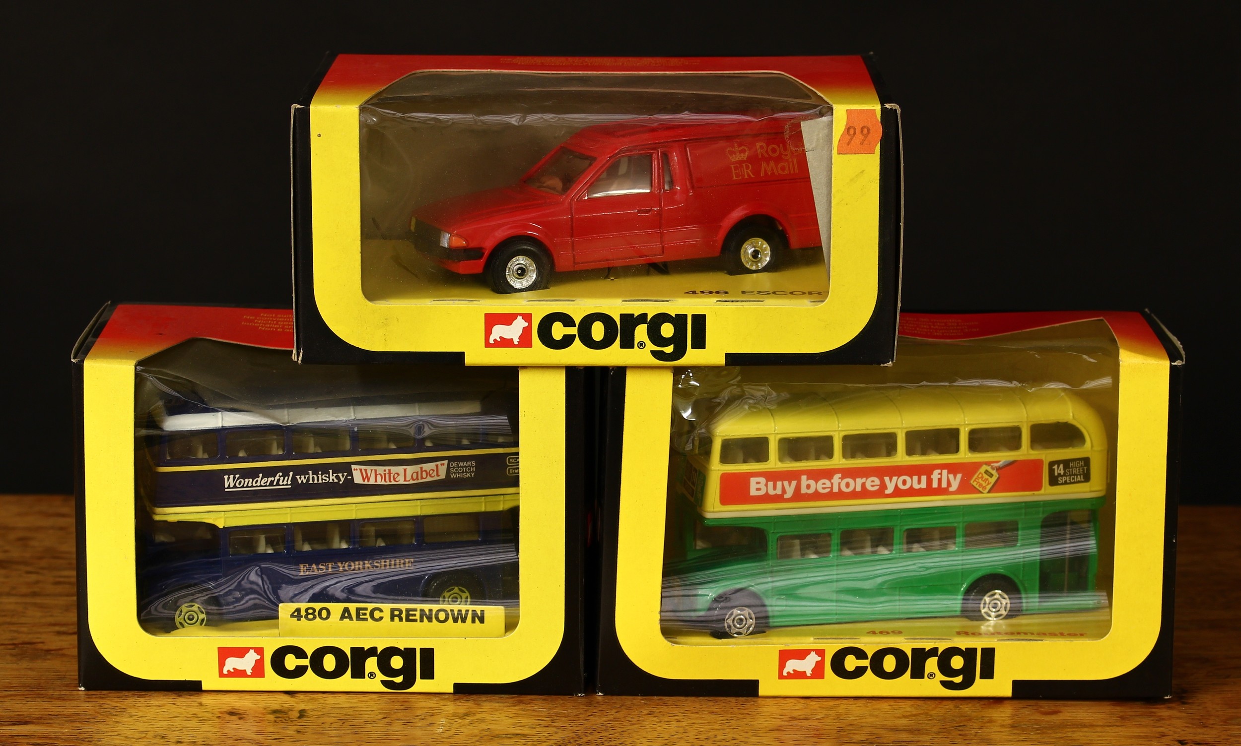 Corgi Toys 469 Routemaster bus, green and yellow body, 'Buy before you fly' decals, window boxed;