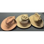 Three Australian Slouch Hats. Two are post war military issue, the other is a civilian example (3)