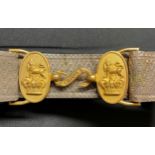 A Victorian Royal Artillery officers brocade belt with VR Lion & Queen Crown gilt buckles with snake