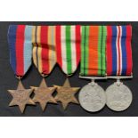 WW2 British Desert Rat's medal group comprising of 1939-45 Star, Africa Star, Italy Star, Defence