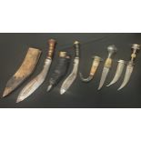 Pair of Jambiya daggers, one with 140mm long blade and stone inset grip and scabbard, the other with