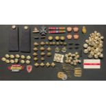 A sellection of post war RAMC insignia and buttons to include: two pairs of Worsted wool RAMC Majors
