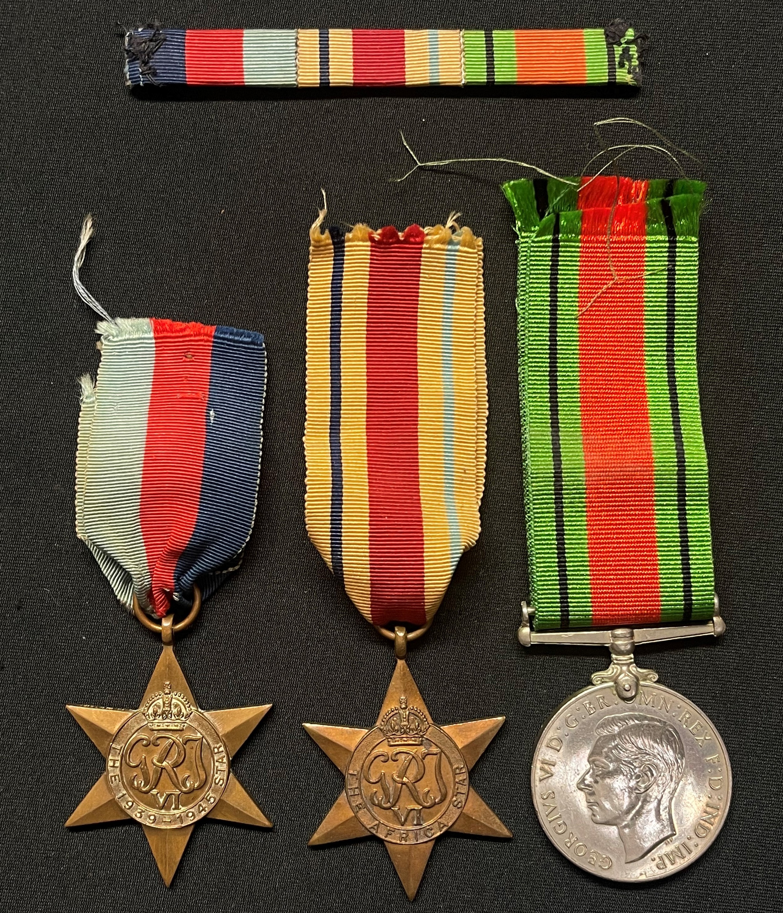 WW2 British Medal Group comprising of 1939-45 Star, Africa Star and Defence Medal. Complete with