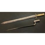 A Brunswick Rifle Bayonet with fullered double edged blade 550mm in length, brass grip, overall