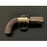 British Percussion Cap Pepperpot Pistol with 65mm long barrel. Bore approx. 9mm. Working action.