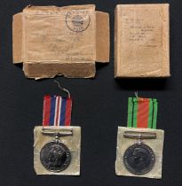 WW2 British RN Medal Group comprising of War Medal and Defence Medal in original box of issue with