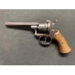 Belgian pinfire revolver, bearing Liege proof marks. 120mm long barrel. Overall length 235mm. Bore