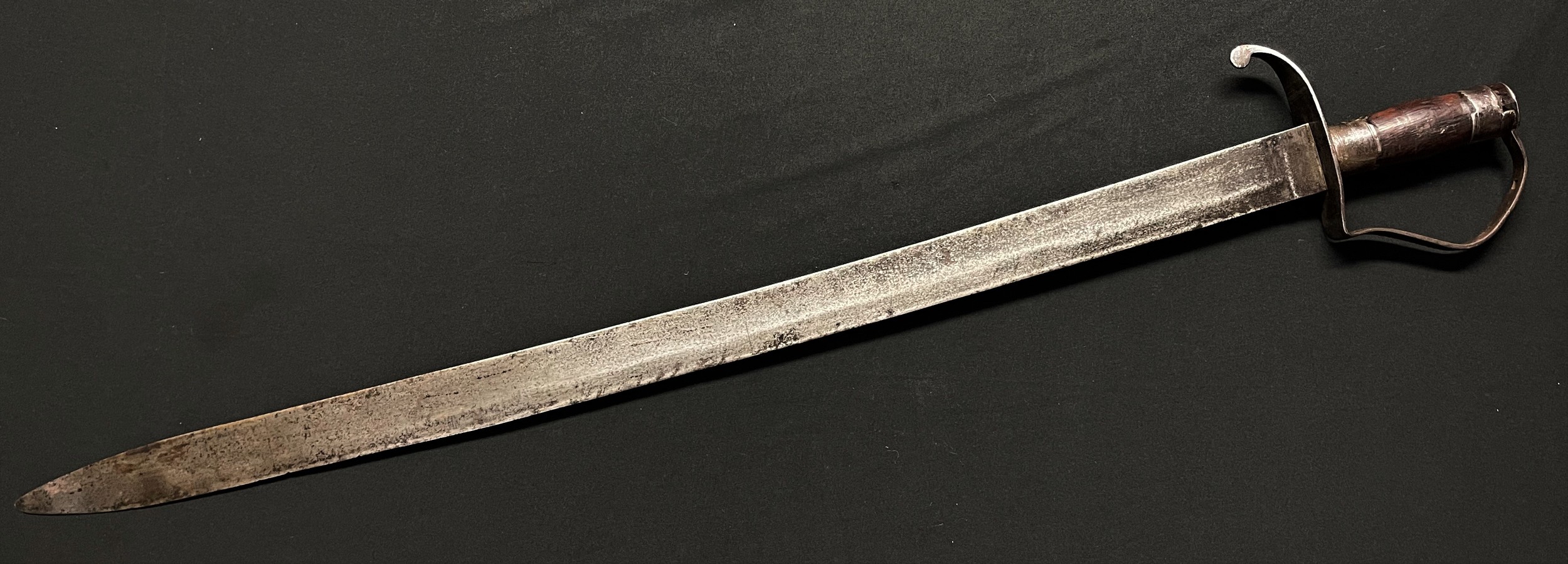 European Broadsword with fullered single edged blade 790 mm in length. No markings. Decorated