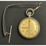 WW2 British Doxa GSTP pocket watch marked to reverse with WD Broad Arrow GSTP H00943. Enamel dial