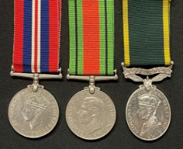 WW2 British Efficiency Medal, War Medal and Defence Medal to 862347 Gnr D Melville, RA. Complete