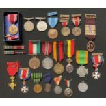 A collection of misc. World Medals to include: WW2 US Good Conduct Medal in box with ribbon bar
