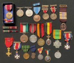 A collection of misc. World Medals to include: WW2 US Good Conduct Medal in box with ribbon bar