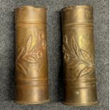 WW1 FN Trench Art Arillery Shell Cases heavily embosed with a floral design. Both examples are dated