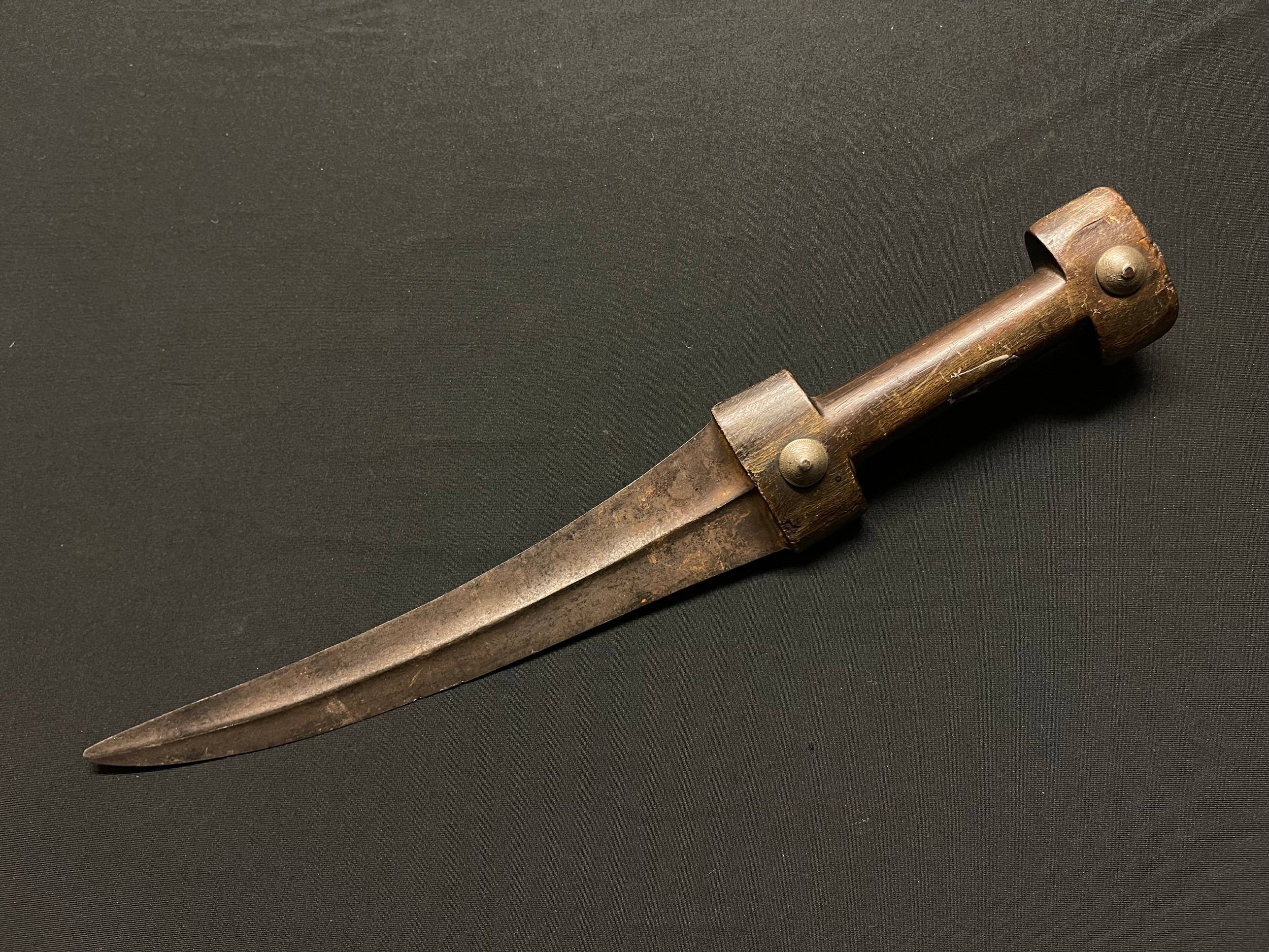 A Middle Eastern kindjal dagger, 24cm curved blade with central ridge, horn handle, 39cm long