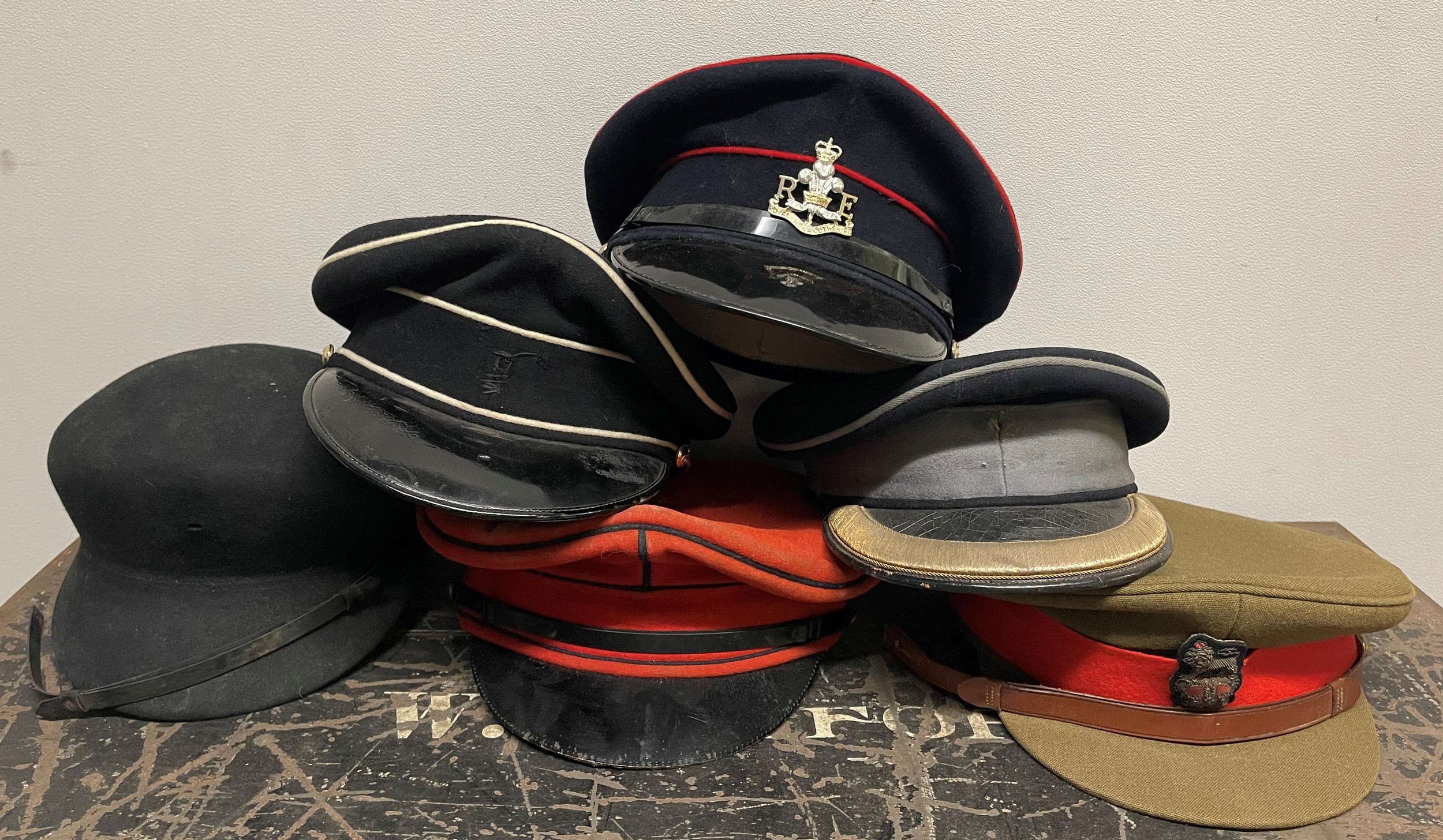 A collection of British Service Dress Caps: General Staff Officers Cap with bullion wire cap badge