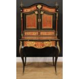 A 19th century gilt metal mounted Boulle and ebonised bonheur du jour, serpentine cresting flanked